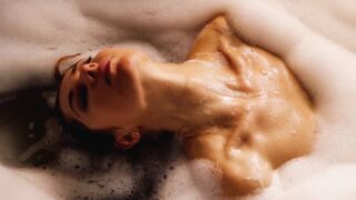 Bubble covered Ukrainian beautiful babe Diana Lark indulging herself in the bath