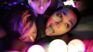 Sexy lesbo girls playing with fluorescent body paint