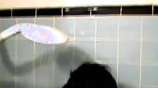 Amateur tatted twink with a tan showers in classics porn