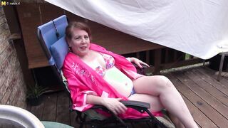 Big Titted mature lady is rubbing her twat & squeezing tits