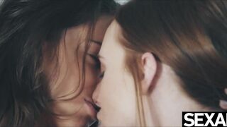 Watch this adorable redhead & hot brunette eat each other's cunt