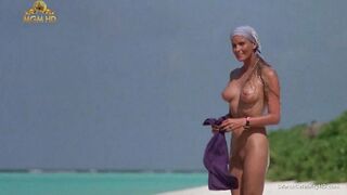 Pretty Bo Derek showing off her bushy twat at the beach