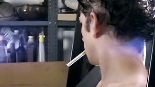 Attractive Ian Madrox is blowing smoke & starts stretching his shaft in his smo