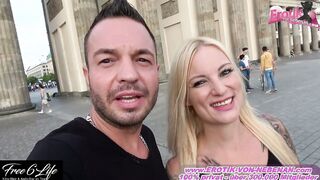 Bold Lovers Engage in Risky Public Passion at the Brandenburg Gate